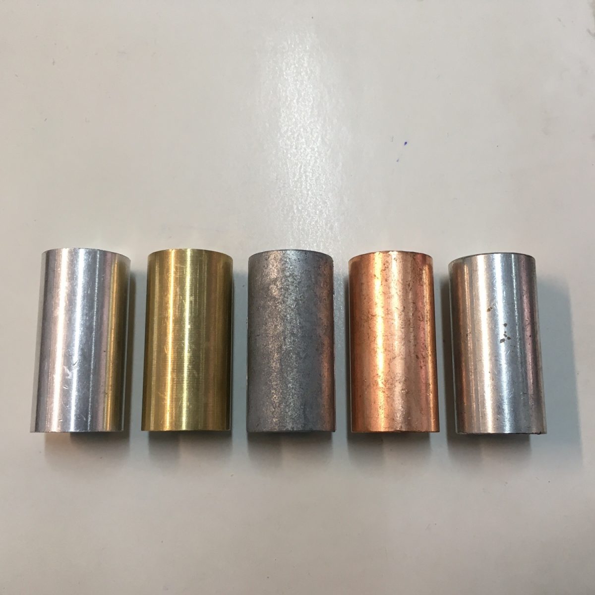 Cylinder set of 5 same volume different weight - Image 1